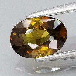 天然石 スフェーン ルース 0.90ct 非加熱 マダガスカル産　 虹が煌めくグリーン・イエローカラー！ 1枚目の画像