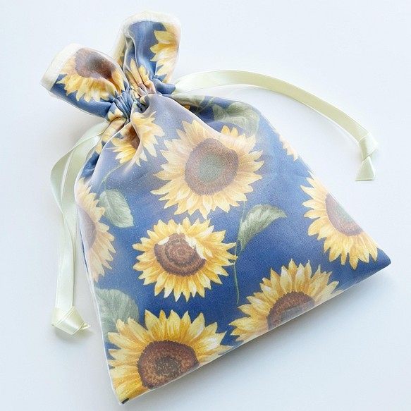 透け感の美しい　上品なオーガンジー花柄巾着ポーチ　ひまわりブルー　向日葵 1枚目の画像