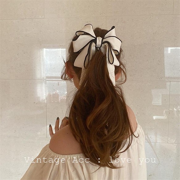 韓国ファッション　大きめホワイトリボンヘアクリップ　アクセサリー　-7135 1枚目の画像