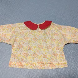 女児110サイズ　ハンドメイドの赤い衿のブルオーバー 1枚目の画像