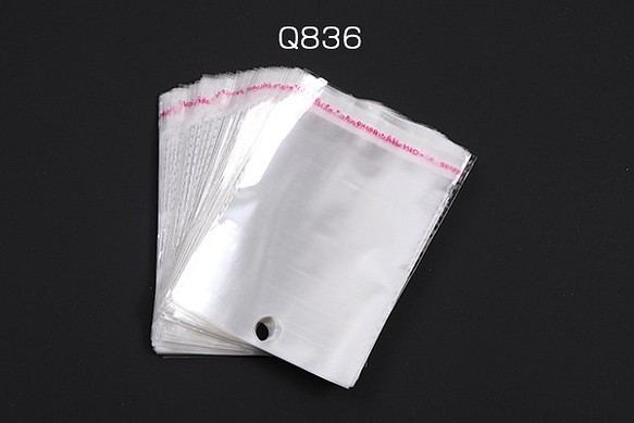 Q836  200枚   OPP袋 透明テープ付き 1穴 10×14cm   2X（100枚） 1枚目の画像