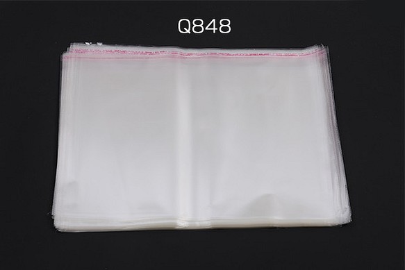 Q848  50枚  OPP袋 透明テープ付き 1穴 39.5×45cm（50枚） 1枚目の画像