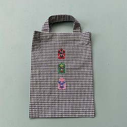 クロスステッチを手刺繍したミニバッグ（1点もの）　覆面レスラー、ルチャ・リブレ 1枚目の画像