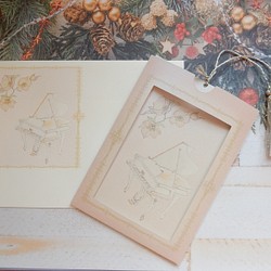 クリスマスローズとペトロフ風ピアノ♡タッセル付きメッセージカード（郵送封筒付き） 1枚目の画像