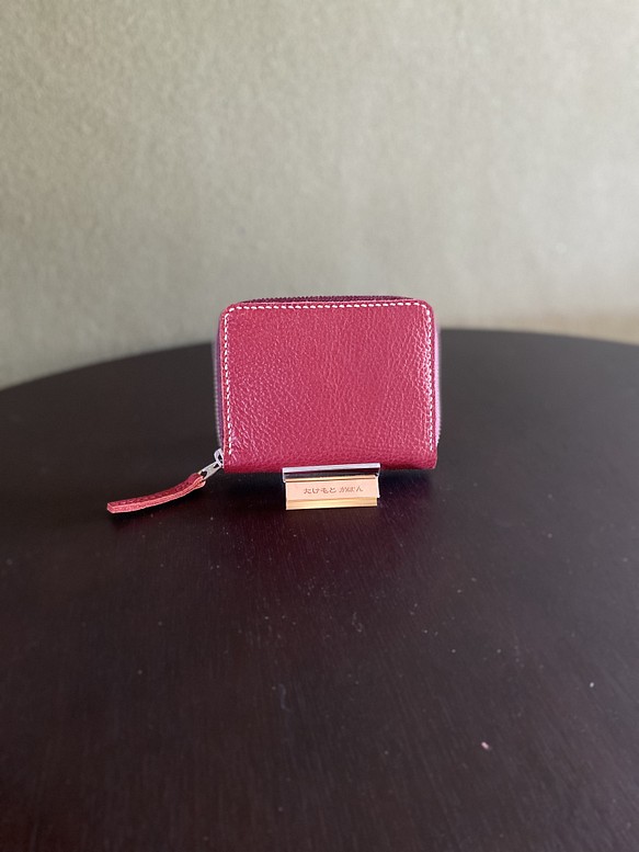イタリア産アドリア牛革のラウンドファスナー二つ折り財布『赤色』 1枚目の画像