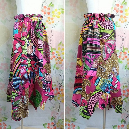 日本売 アフリカ布ピンク色でまとめたパッチワークのスカート【輝き