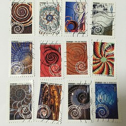 使用済切手  フランス  ウズマキ・ぐるぐるのグリーティング切手12枚セット 1枚目の画像