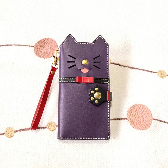 仕舞い忘れのベロ出しにゃんこ＊leather sumyaho case＊手帳型レザー