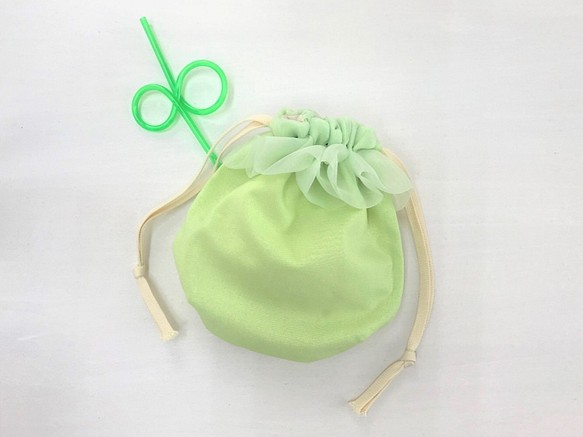 Organdy荷葉邊圓形抽繩袋瓜綠色 第1張的照片