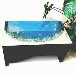 ブルームーンビーチ スターフッィシュと青い海のテーブル 1枚目の画像
