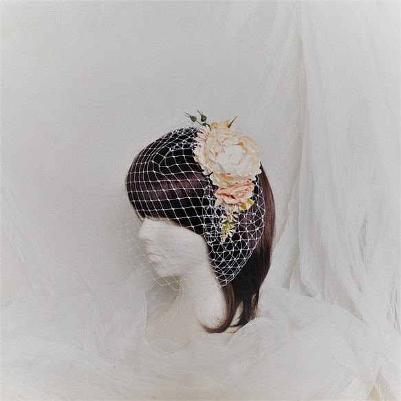 新娘頭飾（鳥籠和大包） 第1張的照片
