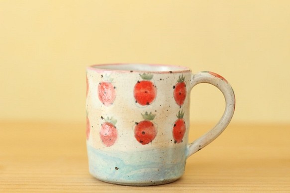 ※按訂單生產一杯帶有撒粉草莓的藍色邊框。 第1張的照片