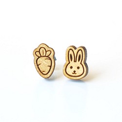 『田田製作所』素色木耳環-小兔子與它的紅蘿蔔(耳夾) 第1張的照片