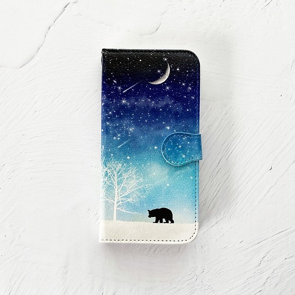 冬の星空・クマ 手帳型 iPhoneケース スマホケース 全機種対応 名入れ可能 くま iPhone13 1枚目の画像