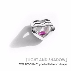 “LIGHT AND SHADOW”心形物體~~~施華洛世奇·水晶和銀項鍊~~~ 第1張的照片