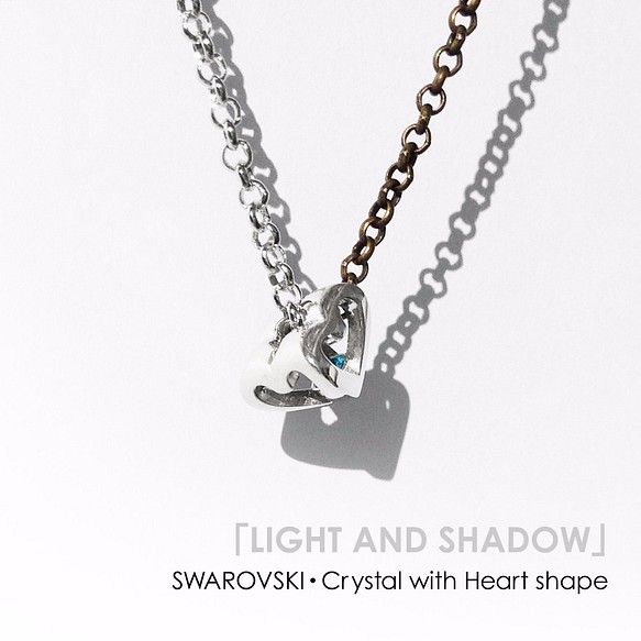 “LIGHT AND SHADOW”心形物體~~~施華洛世奇·水晶和銀項鍊~~~ 第1張的照片