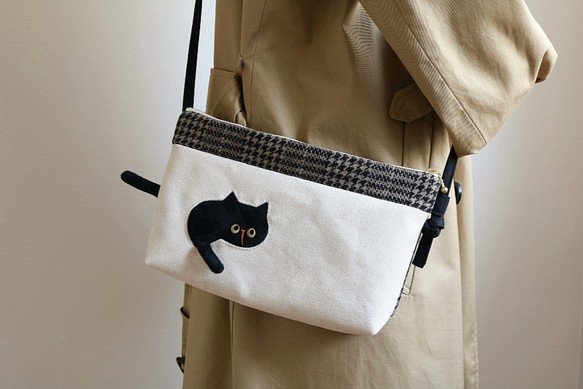 穿過貓袋的貓袋（黑貓25厘米秋冬的固定毛） 第1張的照片