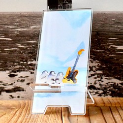 氷上でペンギンとギターが出逢うアクリルスマホスタンド 1枚目の画像