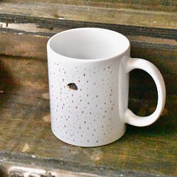 ハリネズミとチューリップのマグカップ 1枚目の画像