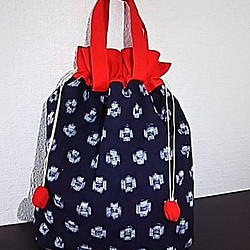 紺の絣と赤の巾着バッグ 1枚目の画像