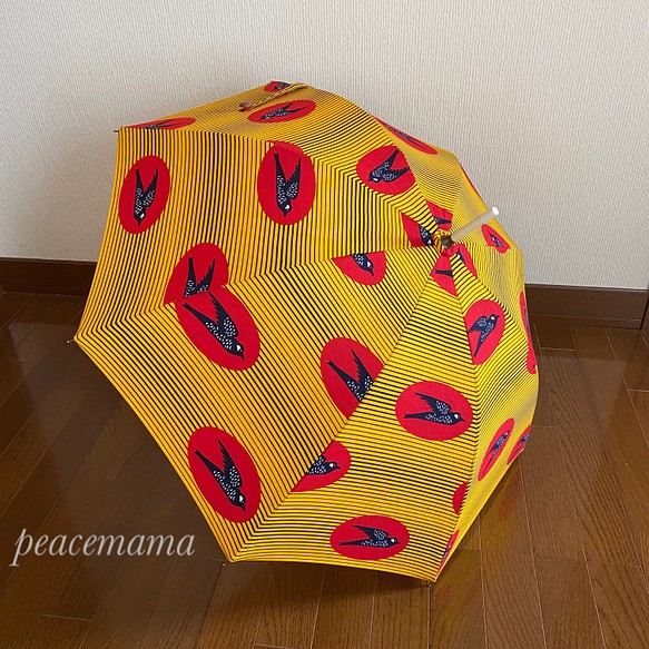 アフリカンバティックの日傘（オレンジ　ツバメ柄）