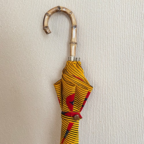 アフリカンバティックの日傘（オレンジ ツバメ柄） 小物・ファッション 