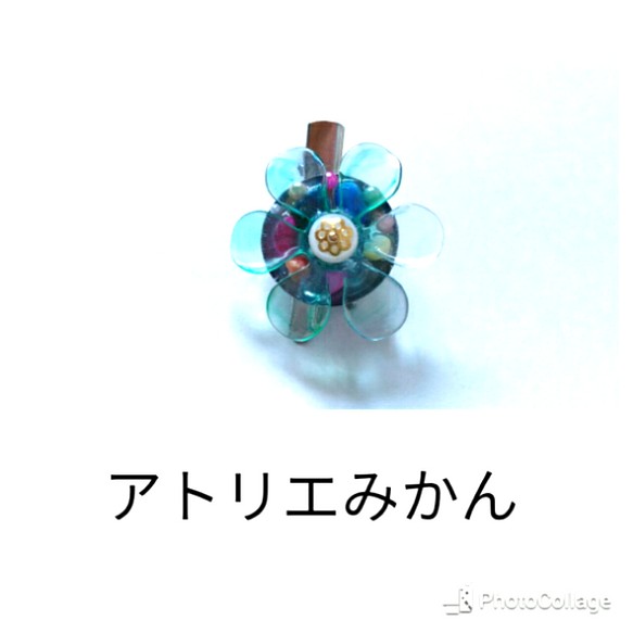 【送料無料】透き通るようなハワイアンブルーの花ブローチ 1枚目の画像