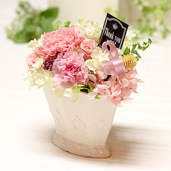 粉色康乃馨和玫瑰安排康乃馨保鮮花花朵 第1張的照片