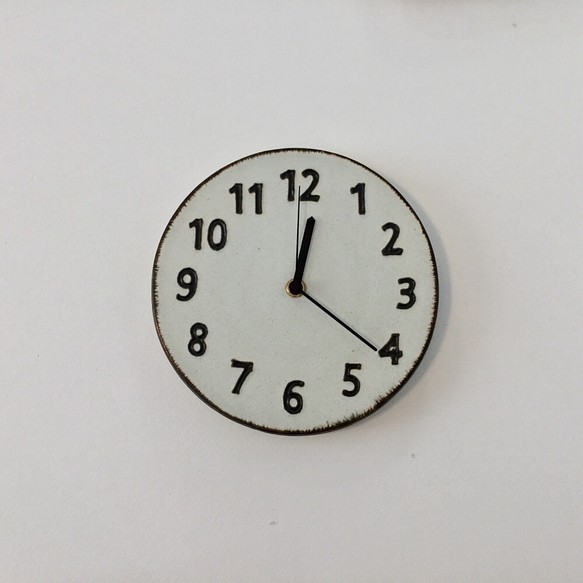 陶シンプル 掛け時計 白 1枚目の画像