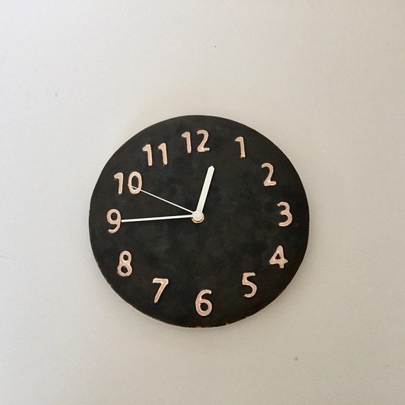 陶シンプル掛け時計 黒 1枚目の画像