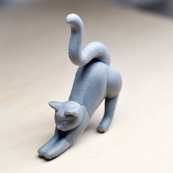 貓形托勒漆材料戒指架或小雕像 第1張的照片