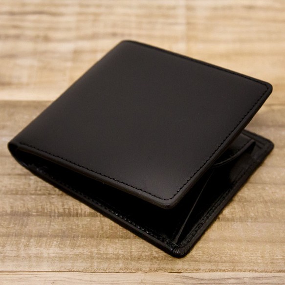 <送料無料>ヌメ革シンプルな二つ折り財布　ブラック（レザー 牛キップヌメ） 1枚目の画像