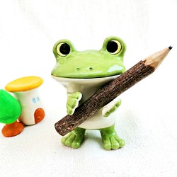青蛙筆架綠色透明陶器青蛙 第1張的照片