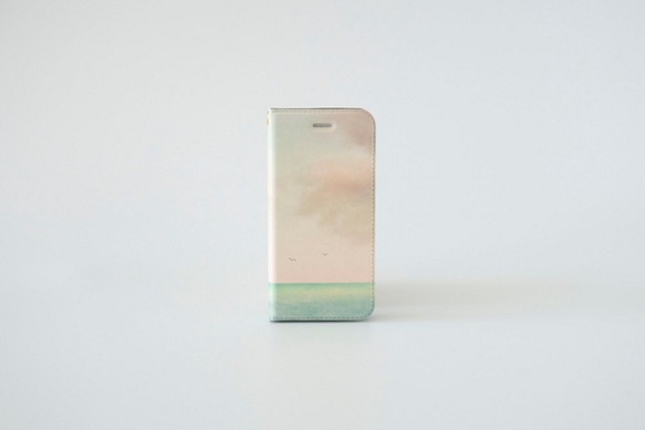 エメラルドグリーン色の海と空の、手帳型スマホケース｜iPhone・Android 1枚目の画像