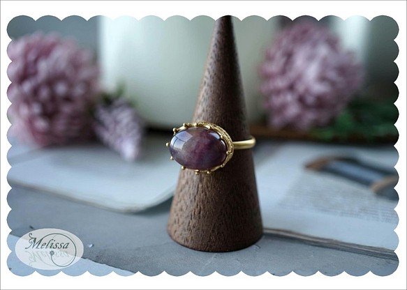紫色のフローライトのリング<フリーサイズ> 1枚目の画像