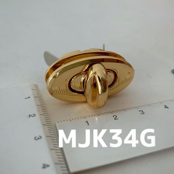 MJK34G オーバル型ひねり金具(ひねり止め)34*19mmピカピカゴールド色 1組 1枚目の画像