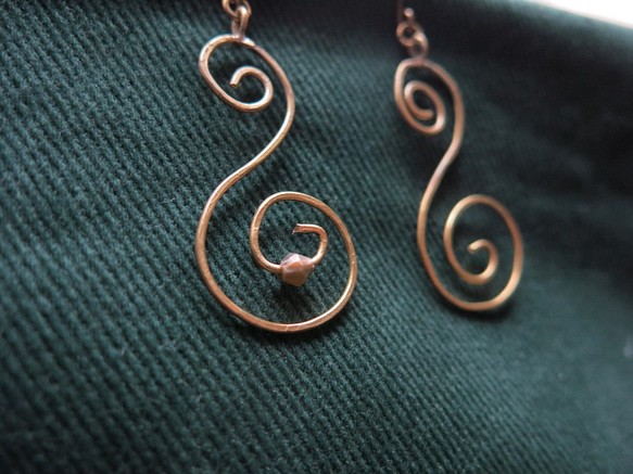 henna的旋轉線 耳環 第1張的照片