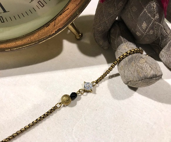 黑瑪瑙鑽砂珠鋯石銅手鍊 第1張的照片