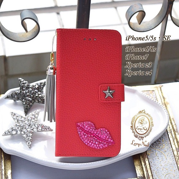 [iPhone]明星☆閃粉色唇彩寶石♡親吻洋紅色粉紅色玫瑰灰色流蘇錶帶紅色筆記本型錶殼 第1張的照片