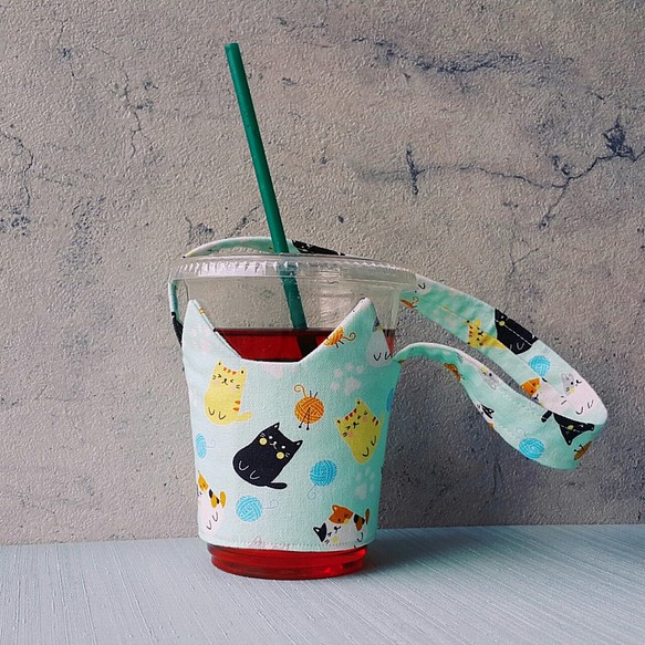 環保飲料杯袋－淺綠貓耳朵 第1張的照片