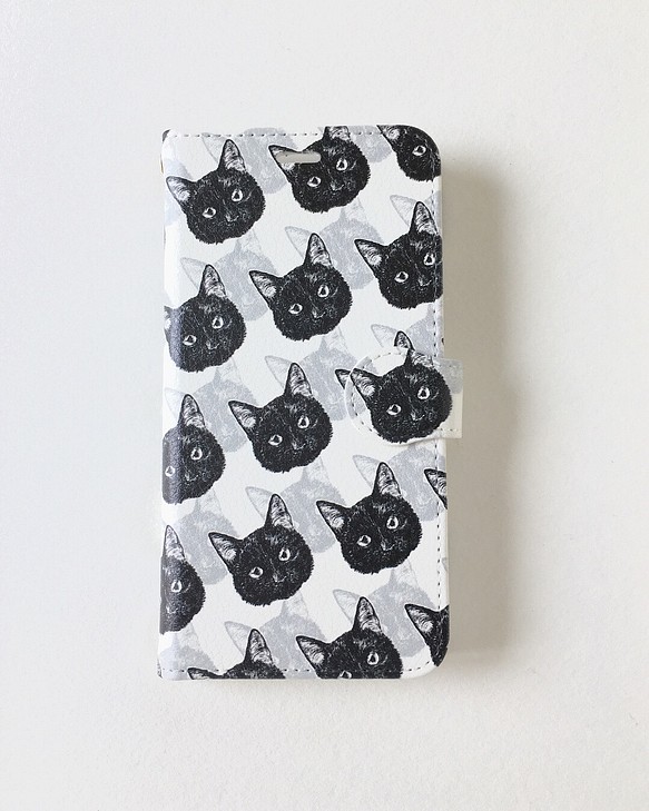 黒猫/ホワイトiPhone手帳 1枚目の画像