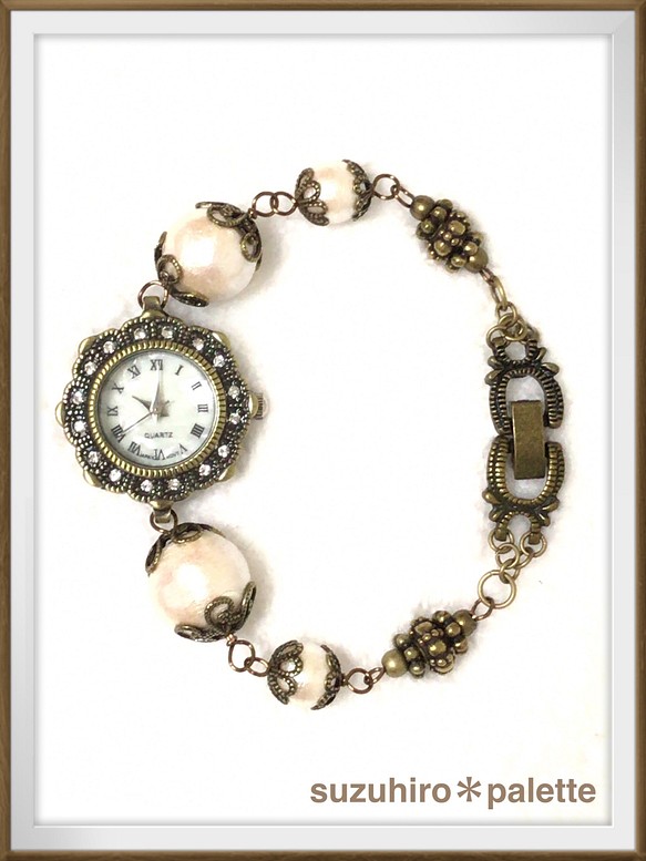 コットンパールのアンティーク風腕時計 ホワイト 1枚目の画像