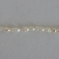 淡水パール　ライス(細長い型) ホワイト 2×3-4mm C級品  商品番号3102C 1枚目の画像