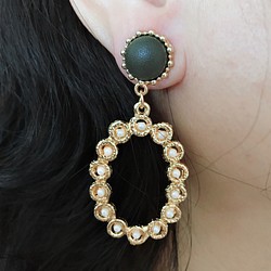 圓形皮革珍珠耳環 第1張的照片