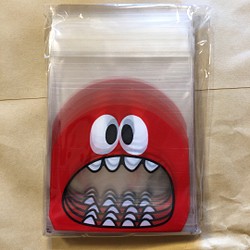 送料込み！怪獣さんのOPP袋 約100袋 赤 1枚目の画像