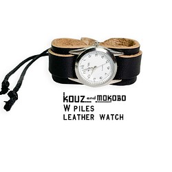 ▲ 帶有 WPILES 設計的單調黑色“W Piles 手錶”易讀錶盤（WPW-KKK-K） 第1張的照片