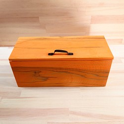 かぼちゃ色のトイレットペーパー収納箱、木製 1枚目の画像