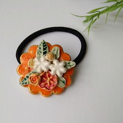 陶器の花束オレンジヘアアクセ※受注製作※ 1枚目の画像