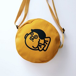 芥黃色嘟子－斜背圓揹包 帆布包  側背包 可調整式揹帶 第1張的照片
