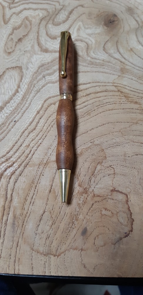 木製ボールペン　サペリ杢  回転式 ファンライン  松脂蜜蝋&椿油仕上げ 1枚目の画像